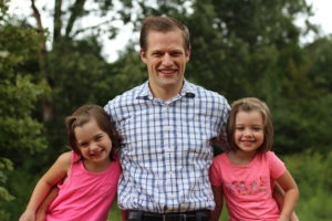 Owner of BuyLifeInsuranceForBurial.com, David Duford, with his two 5-year old girls.